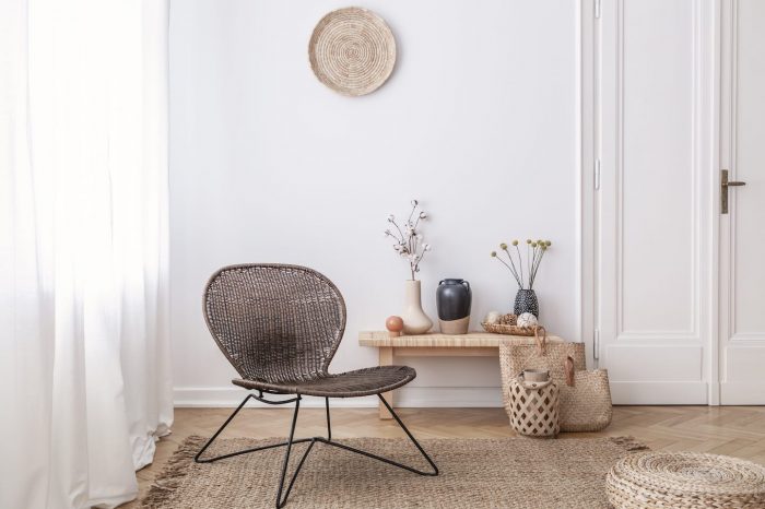 dark-modern-wicker-chair-in-a-white-living-room-698KB7D